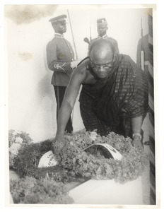 N. A. Welbeck lays a wreath at the graveside of W. E. B. Du Bois