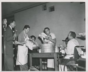 Clients washing dishes during a Club Can Do recording at ICD