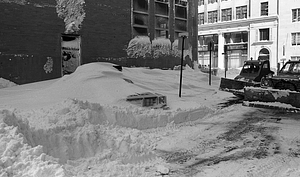 Parked car under snowdrifts on Berkeley Street