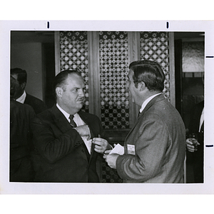 Ernest Henderson III, at left, and Frederick J. Davis converse at a Boys' Club meeting