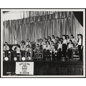 The Bunker Hillbillies and the Junior Wranglers perform on a stage