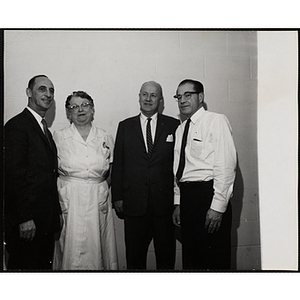 Boys' Club of Boston Assistant Executive Director Louis Zeamby (right), Chefs' Club Committee member Mary A. Sciacca (second from left), Boys' Club of Boston Executive Director Arthur T. Burger (second from right) and Brandeis University Director of Dining Halls and Chef's Club Committee member Norman R. Grimm (right) pose in a Howard Jonson's