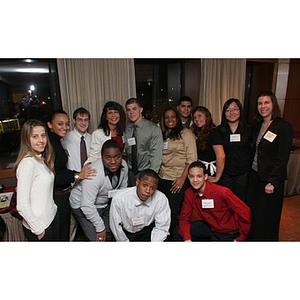 Philomena Mantella and Meghan Allen-Eliason pose with the Torch Scholars at an event