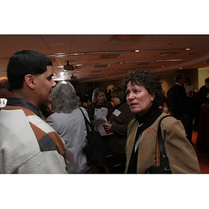 Danny Vazquez and a woman at a Torch Scholars event