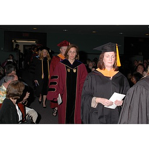 Faculty members proceed into School of Nursing convocation