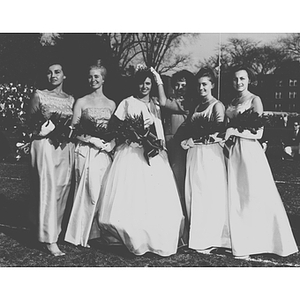 Northeastern's Homecoming Queen is crowned by last year's queen and surrounded by her court