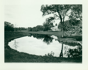 Exterior view of Lyman Estate, Waltham, Mass., from across grounds and pond.