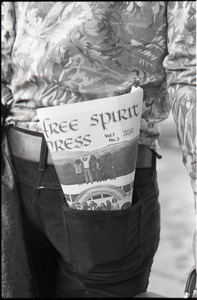 Close-up of Free Spirit Press (vol. 1, 4) in Tom Frank's rear pocket