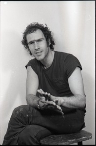 Studio portrait of Richard Safft, seated on a stool