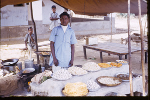 Seller of sweets at a market in Mangadu