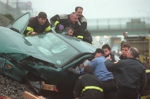 Fire fighters and rescue workers respond to an automobile accident on Route 95