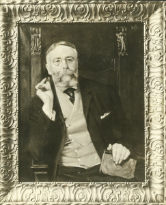 William H. Bowker with cigar and book