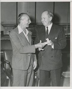 Jeremiah Milbank awarding man