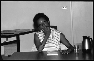 Nancy Morejón, Cuban writer, speaking at the Institute for the Humanities, UMass Amherst, seated at a table for discussion