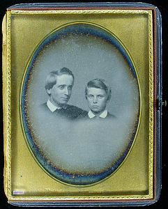 Vignetted bust-length portrait of two boys
