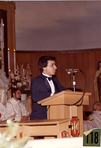 Man speaking at mass