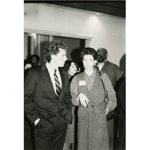 Joseph Kennedy and an unidentified female employee of Inquilinos Boricuas en Acción in the lobby of the Jorge Hernandez Cultural Center.
