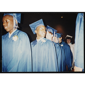 Teenagers line-up during an Edwards School graduation ceremony