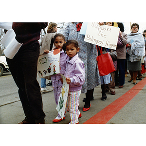 Two young girls in a rally at the Massachusetts State House in support of bilingual education in schools