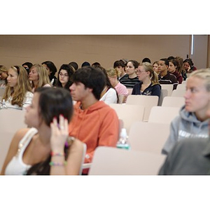 Students attend class in Mugar Hall