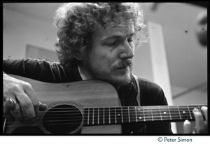 Gordon Lightfoot: half-length portrait, playing guitar