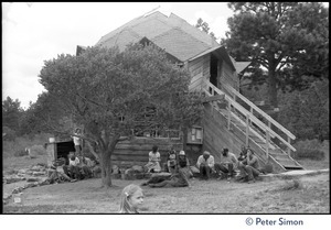 Commune members gathered outside a dome house, Lama Foundation