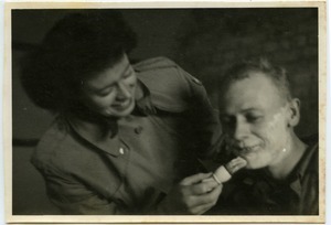 Maida L. Riggs shaving a GI