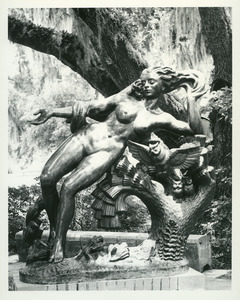 Female nude and owl statue