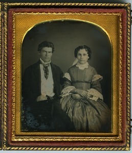Laura B. Dodge and husband: double three-quarter length studio portrait, seated