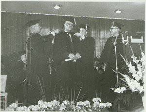 Charles Avila at his hooding ceremony during the Centennial Charter Day convocation