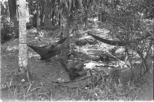 Vietnamese sentries taking siesta; Mekong Delta.