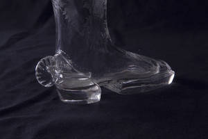 A blown glass boot drinking vessel