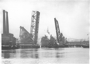 [View of the ship "Salem Maritime" and two tugboats passing through the Meridian Street Bridge]