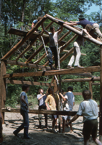 Readjusting rafters (2) at the Moon Barn Raising at entrance to Hopkins Forest on 2 August 1975.