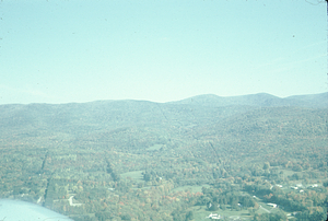Aerial oblique view west to Taconics from between W. Main & Bulkly Streets on 14 October 1971.