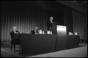 Arthur M. Schlesinger, Jr., speaking at the National Teach-in on the Vietnam War, with other panelists Hans J. Morgenthau (left) and Isaac Deutscher