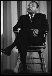 Martin Luther King, Jr., waiting to speak at the Youth, Non-Violence, and Social Change conference, Howard University