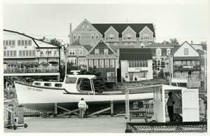 Harbor buildings and stout man