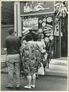 Tourists in front of store