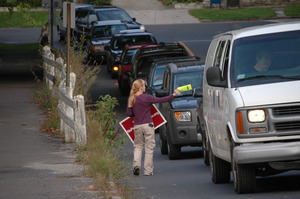 Protest against a pornographic video store in Northampton: protester handing out fliers to cars on North Street