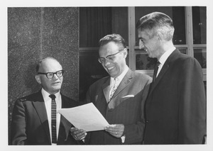 Dr. Fred C. Ellert standing outside Student Union with Dr. Werner and Dr. Hunsberger