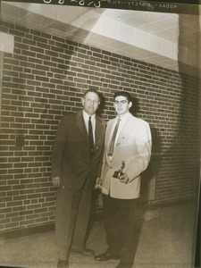 'Tuss' McLaughry and unidentified student athlete at the All Sports banquet