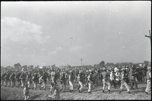 Antiwar demonstration at Fort Dix, N.J.: military police with gas masks deploying against protesters