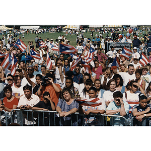 A crowd watches the Festival Puertorriqueño parade