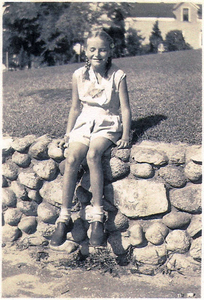 Sitting in the sun on my neighbor's stone wall