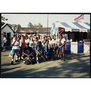 Children gather next to a concession stand at Water Country water park during a Tri-Club field trip