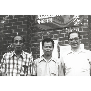 Chinese Progressive Association members, including You King Yee and Long Guang Huang, at their headquarters