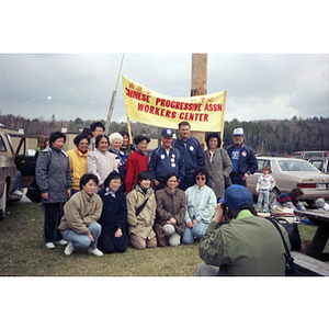 Members of the Chinese Progressive Association Workers' Center at the International Paper Company march and rally