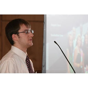 Jordan Munson speaks at a Torch Scholars event