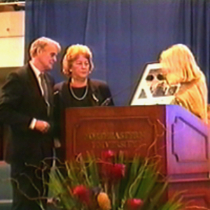 Karen T. Rigg presenting President and Mrs. Curry with a photograph of the Curry Student Center